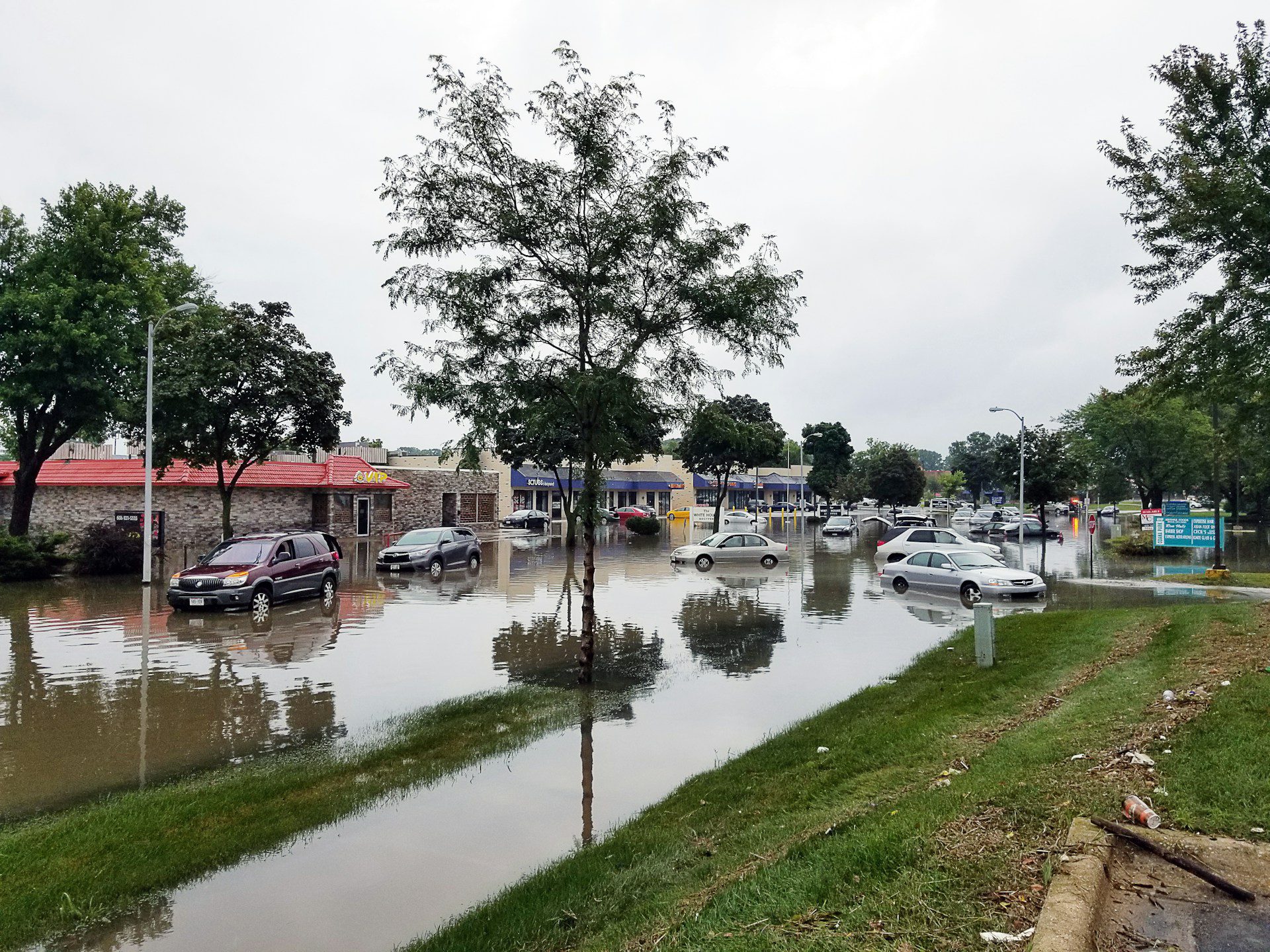 cars buildings floodwater